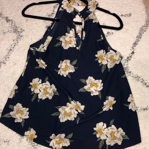 Floral and navy blue zey hole shirt